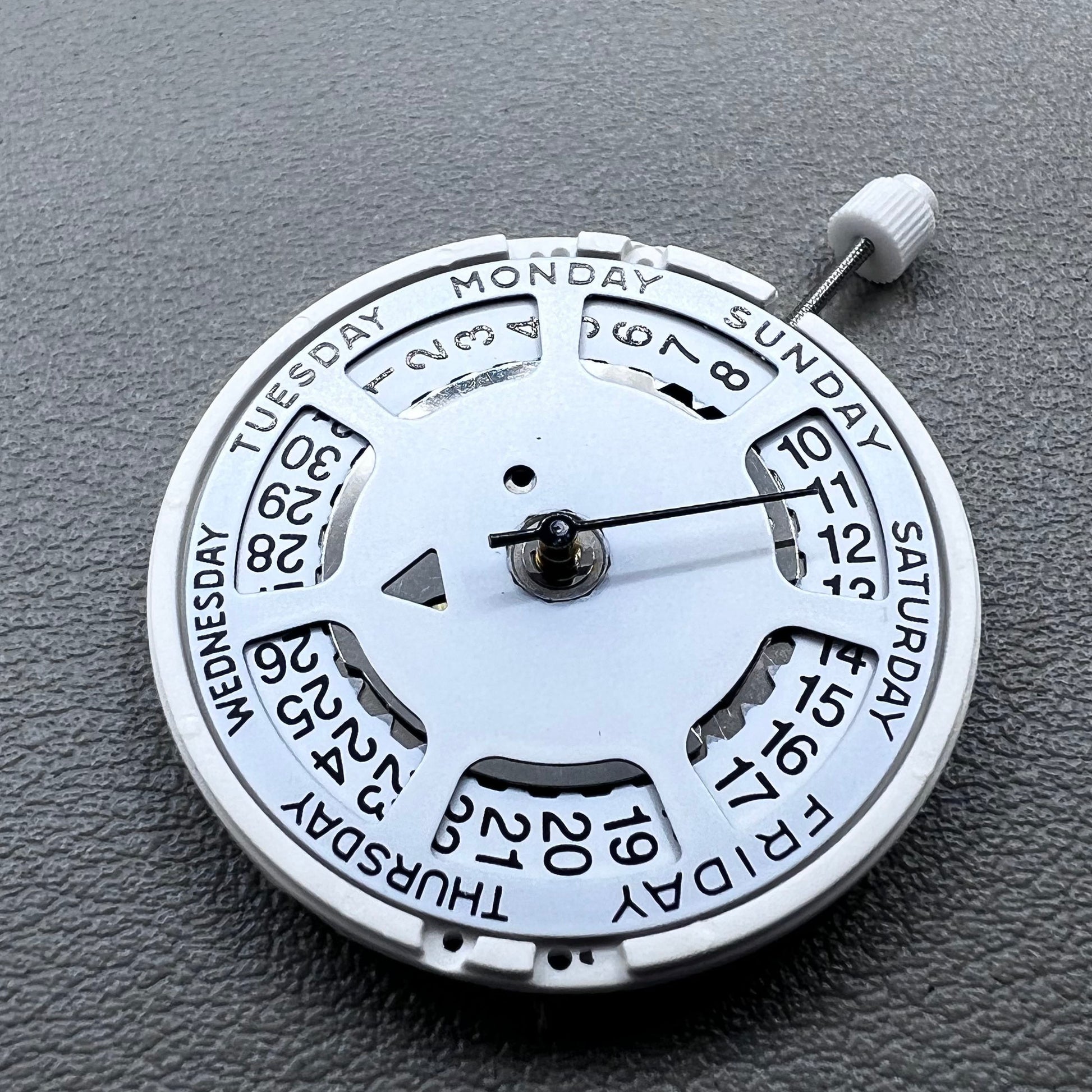 Swiss ISA 1198 watch movement with day-date feature, white dial, date at 3 o?clock.