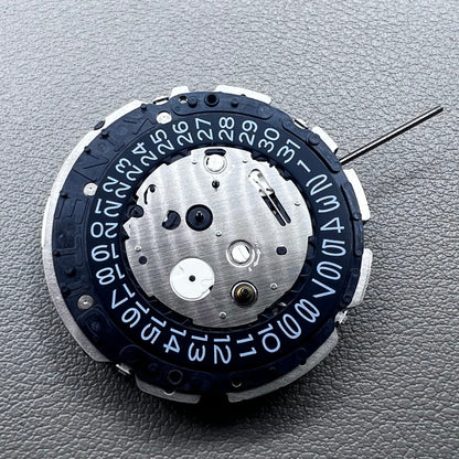 Original Japan Seiko 7L22A Quartz watch movement with black disk for precise timekeeping.