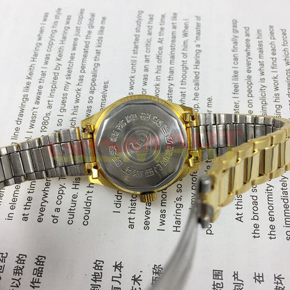 26mm Shanghai Made Lady Manual Watch with 19 Jewels featuring a golden flower grid dial, elegant design by Shanghai for gifting.