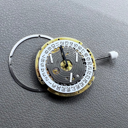 Swiss ISA 8171 golden quartz watch movement with date at 4 o'clock, multi-function design by Swiss ISA.
