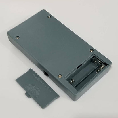 QBC-22 quartz watch and button battery tester by QBC, precise tool for repair accuracy and battery check.