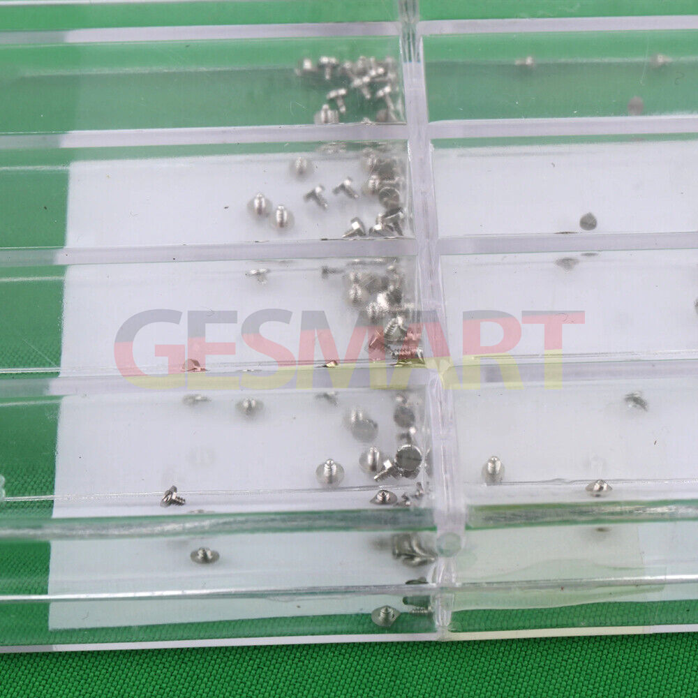 Assortment of watch movement screws in various sizes for precise watch repair and maintenance.