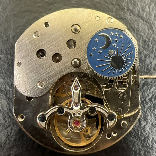 Liaocheng Double Time Zone watch with moonphase at 2, automatic mechanical movement, China made.