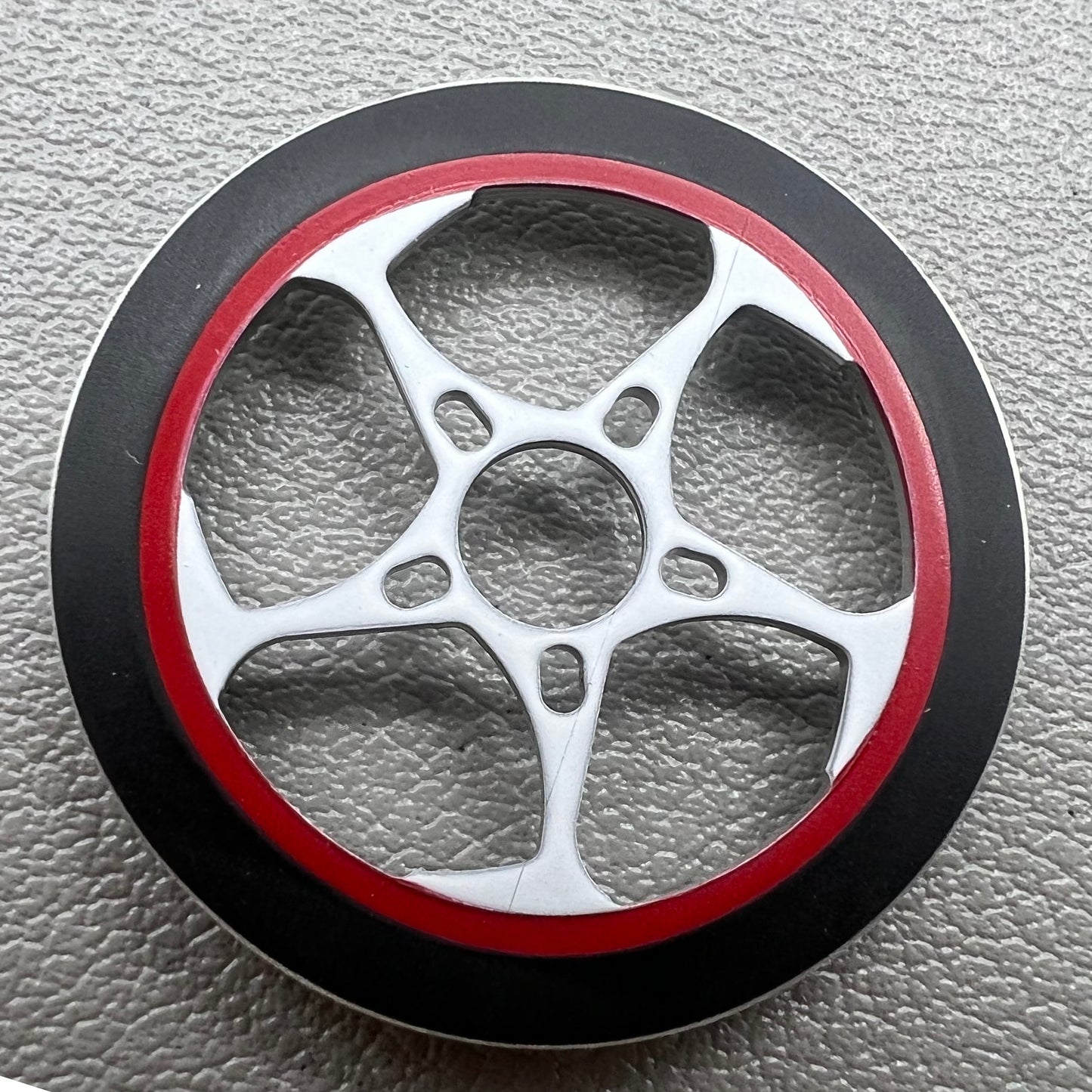 Red and white rotor oscillating weight for NH34-NH39 watch movements, enhancing automatic winding efficiency.