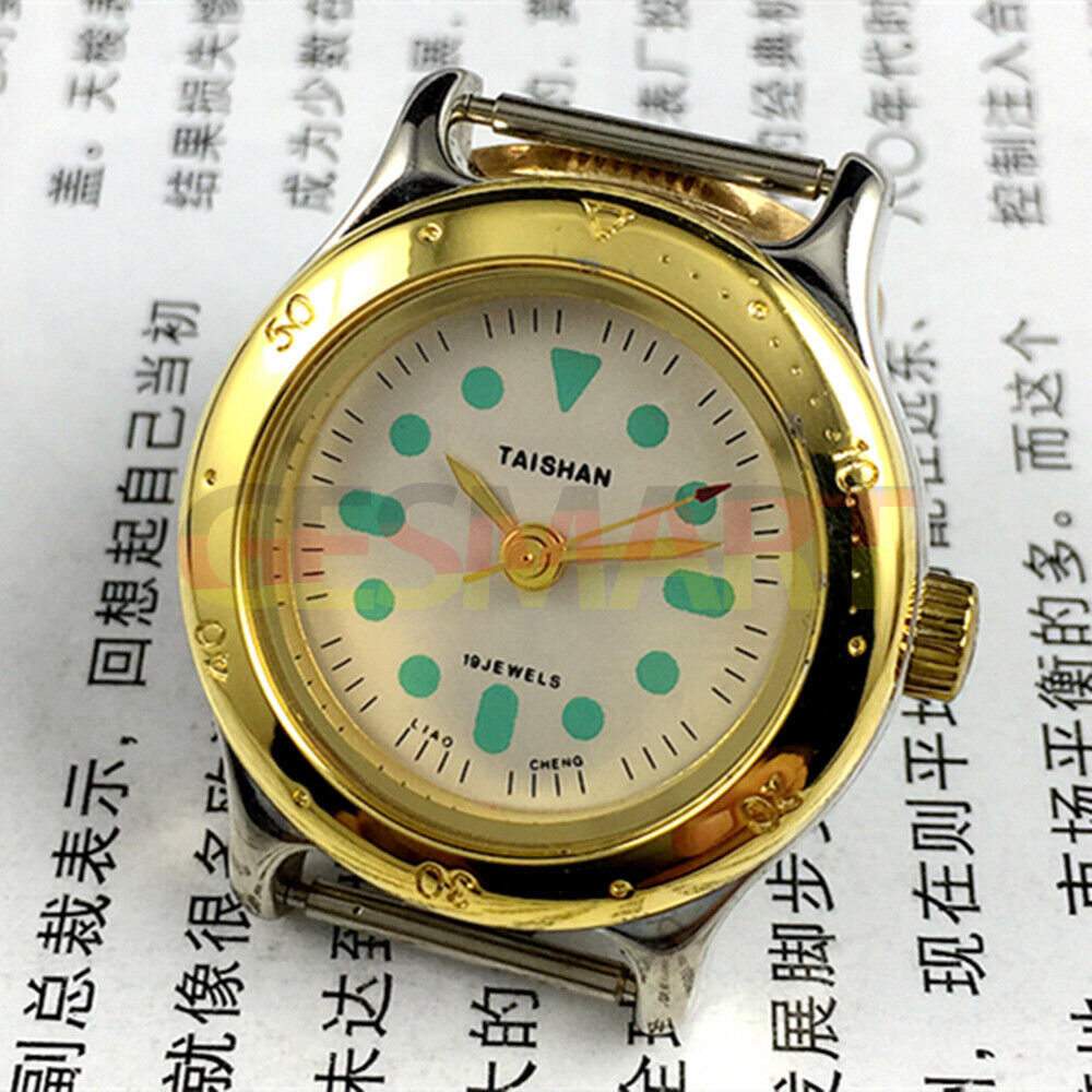 Elegant 28mm TAISHAN manual mechanical lady watch with 19 jewels, golden case, and numeric dial for stylish accessory.