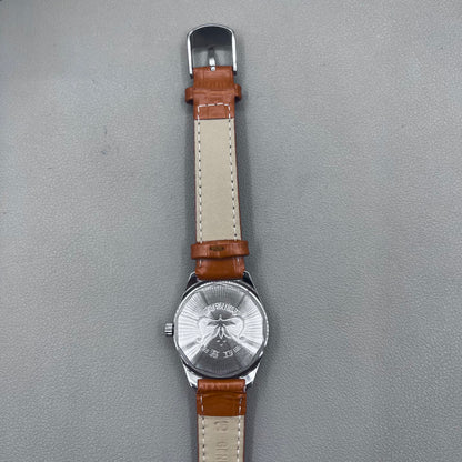 HONGLIAN 32mm brown leather band manual watch with 17 jewels and Roman numeral dial.