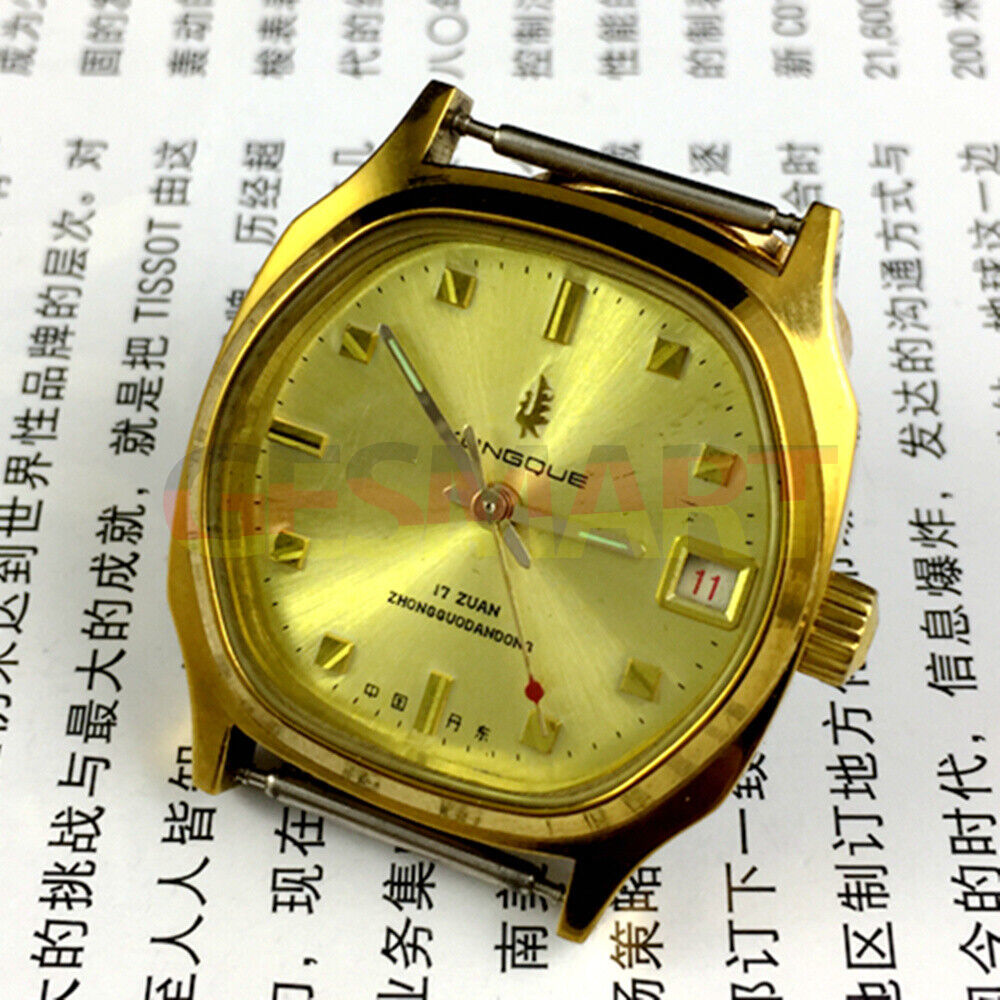 Old Stock Dandong manual mechanical watch featuring 17 jewels, single calendar, and elegant golden dial by Dandong.