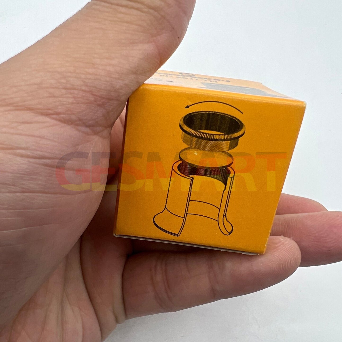 Bergeon 2611-TN-3.5 watchmaker's loupe with 2.8x magnification for detailed accessory inspection.