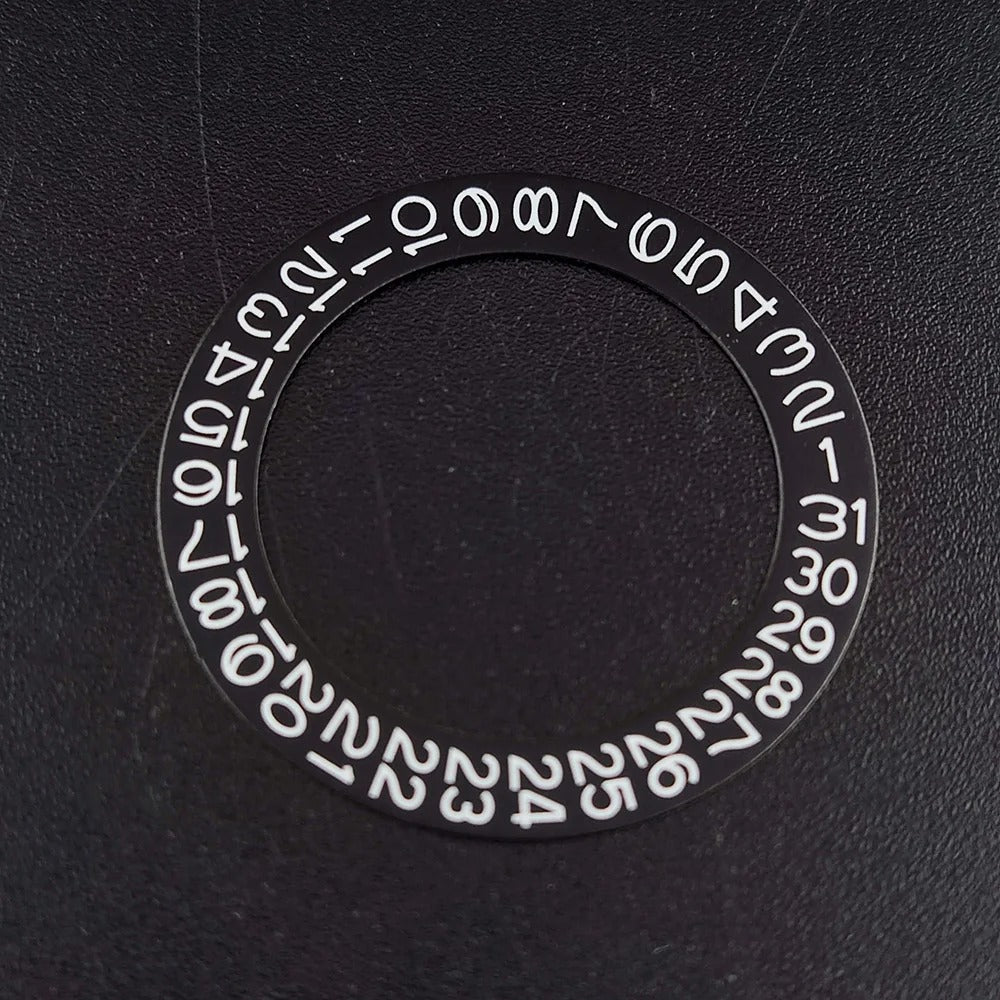 NH 35 watch calendar movement replacement parts with date and day wheel discs.