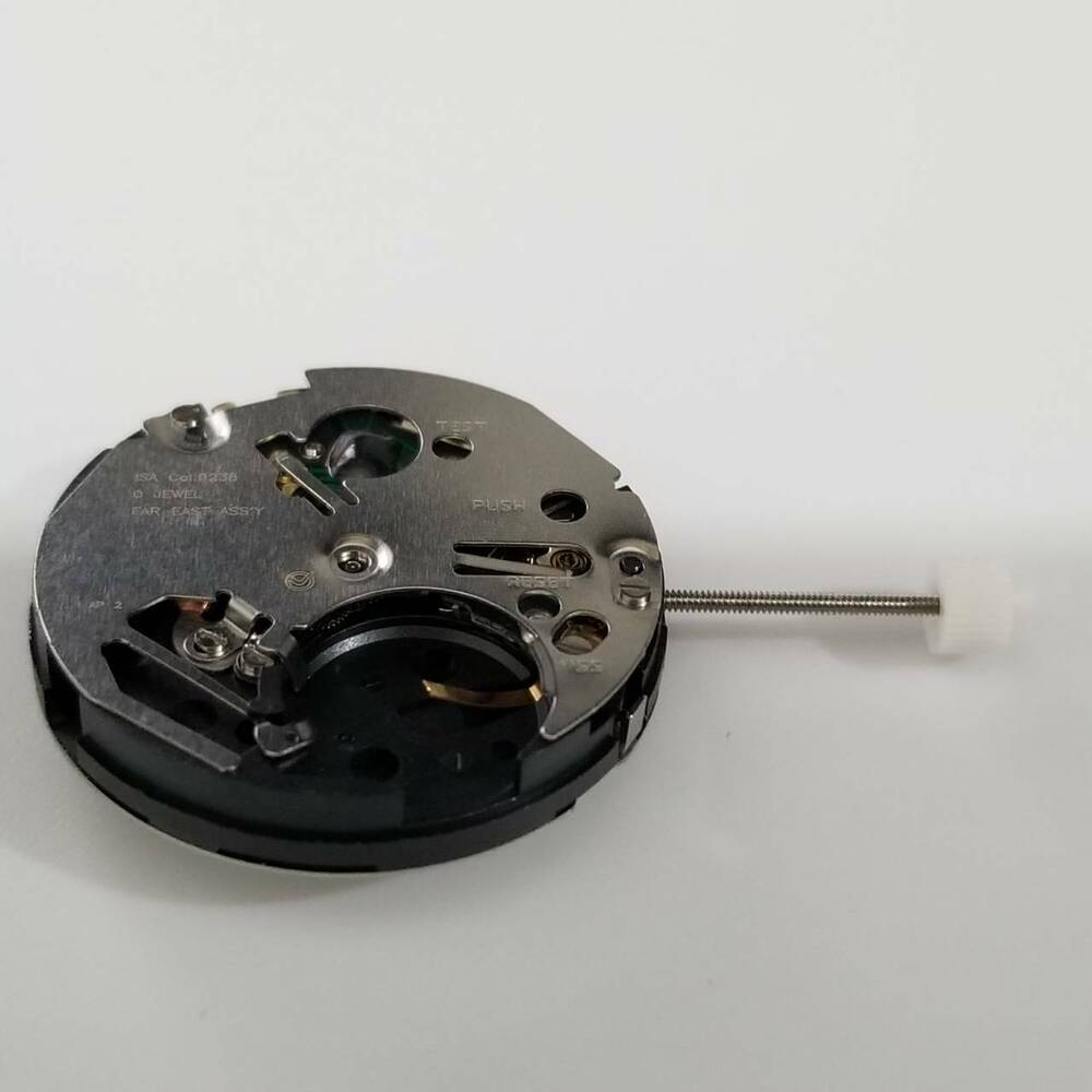 Silver ISA 9238 quartz watch repair part, precision movement component for accurate timekeeping.