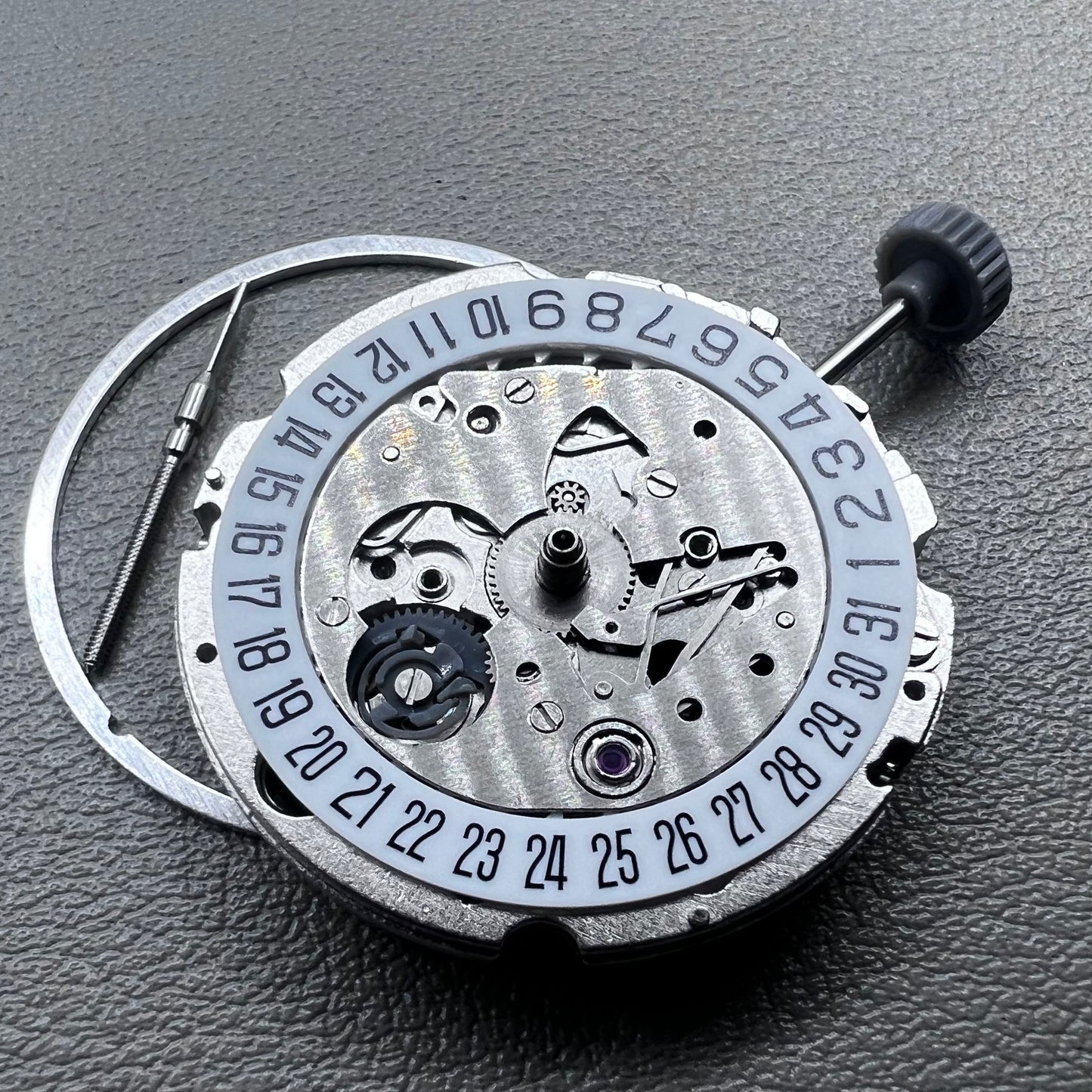Miyota 8200 watch movement with single calendar date at 6 o'clock, precise Japanese mechanism.