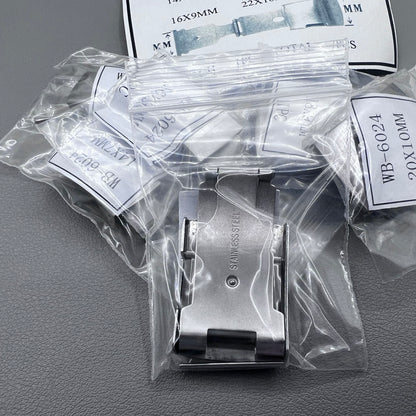 Seven sizes of Metan single push watch buckles for secure watch band fastening.