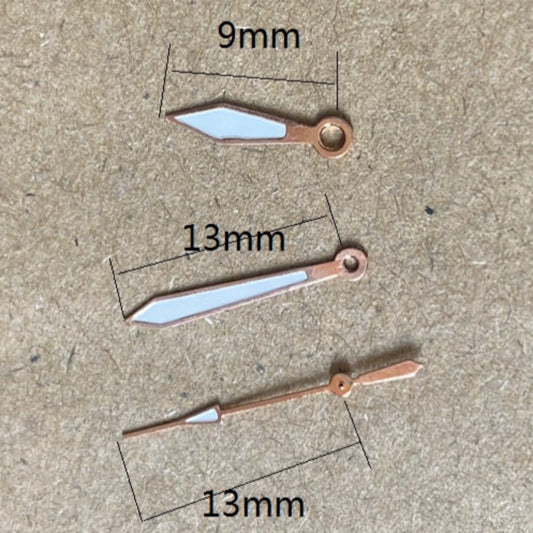 Rose gold arrow-shaped watch hands with green lume for Miyota 2035 quartz movement, stylish and precise.