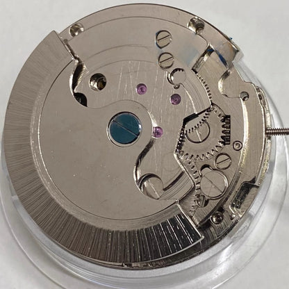 China Made multifunctional automatic mechanical watch with moon phase at 12 o'clock and exposed flywheel mechanism.