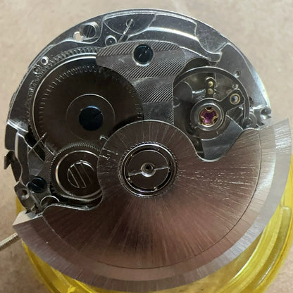 China Made ST10 2393 mechanical watch movement with small seconds and date at 3, 6, 9 positions.