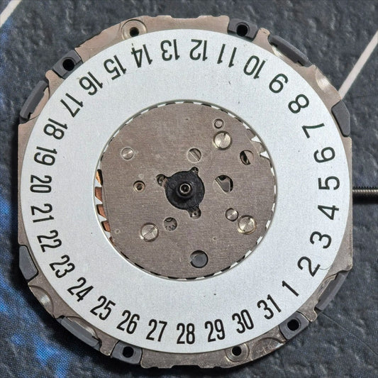 Miyota 4U12 quartz watch movement with single calendar date at 6, Japan made precision.