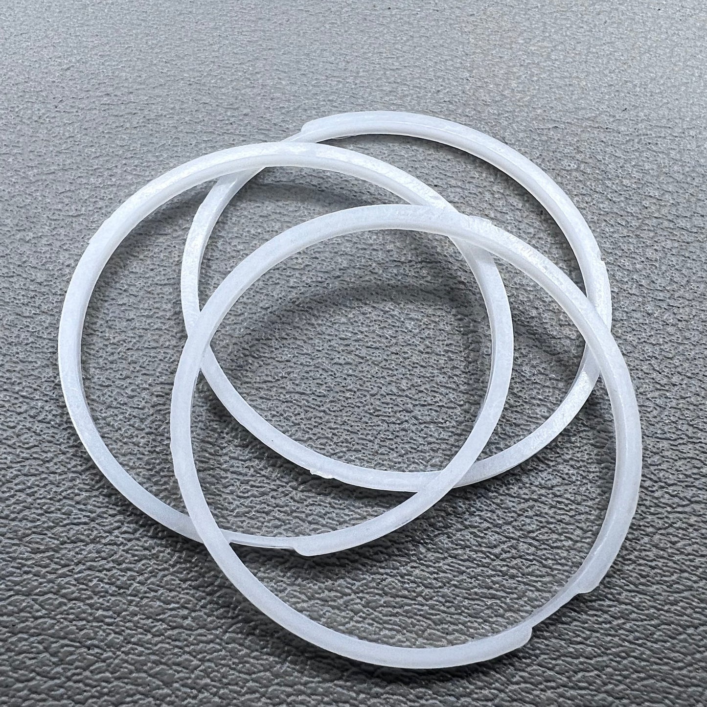 White cushion mount spacer rings set of 3 for 7009 movement watches, precision fit.