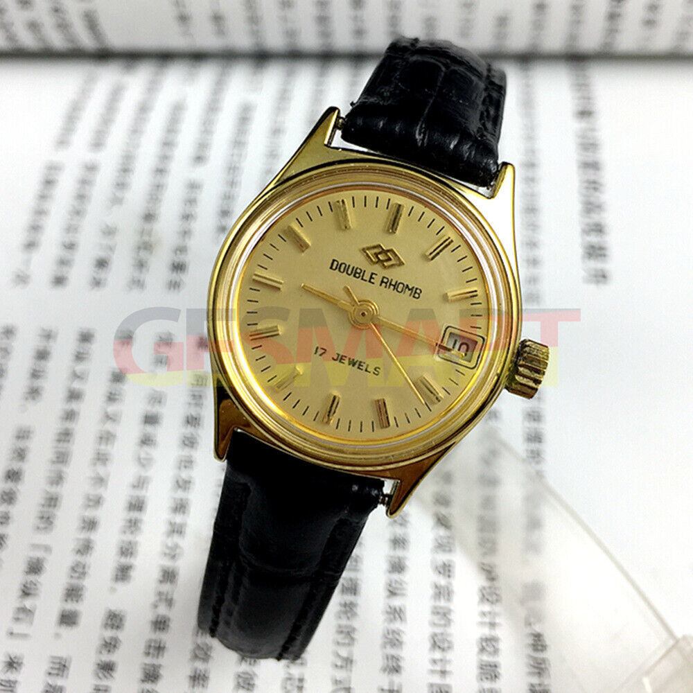 Double Rhomb lady watch with golden dial, manual mechanical movement, single calendar ? elegant accessory.