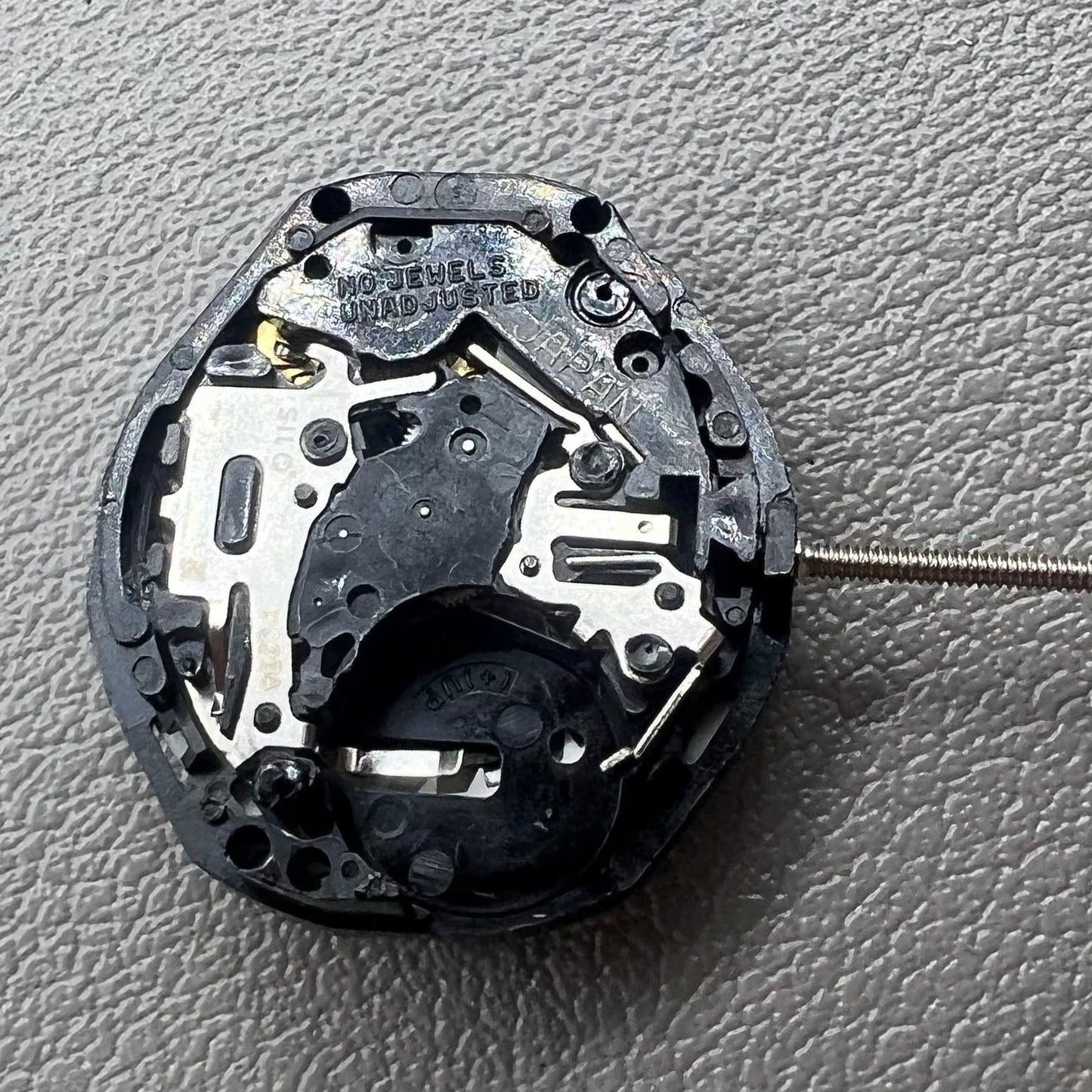 Japan Quartzwerk PC23A watch movement with three hands and double calendar display for precise timekeeping