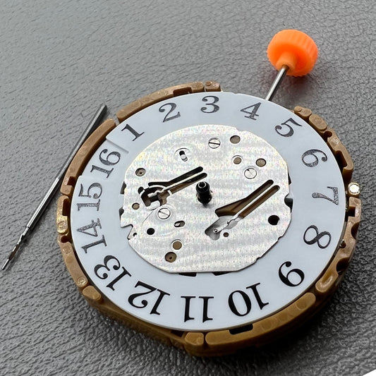 Japan Miyota GP00 quartz watch movement close-up, precision timekeeping mechanism for watches.