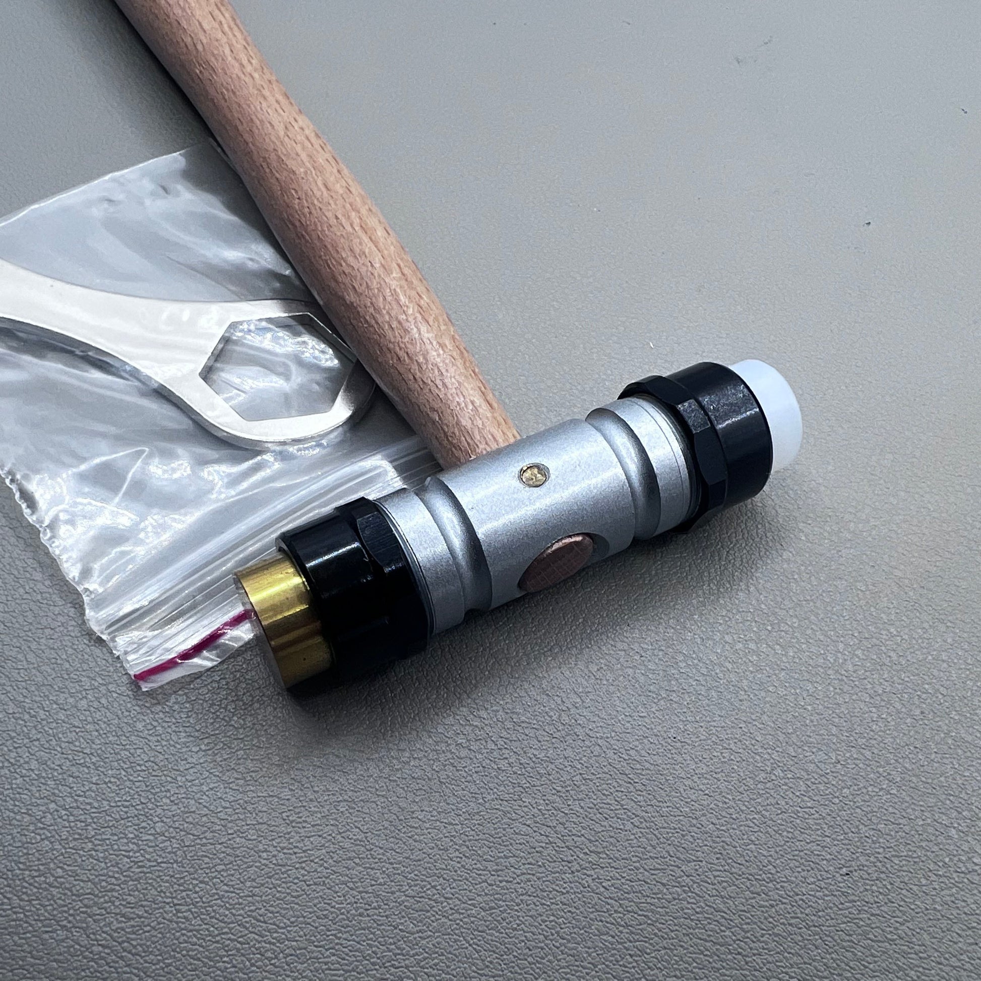 Swiss Tool Bergeon 30417 hammer with replaceable brass and synthetic ends for delicate watch repair tasks.