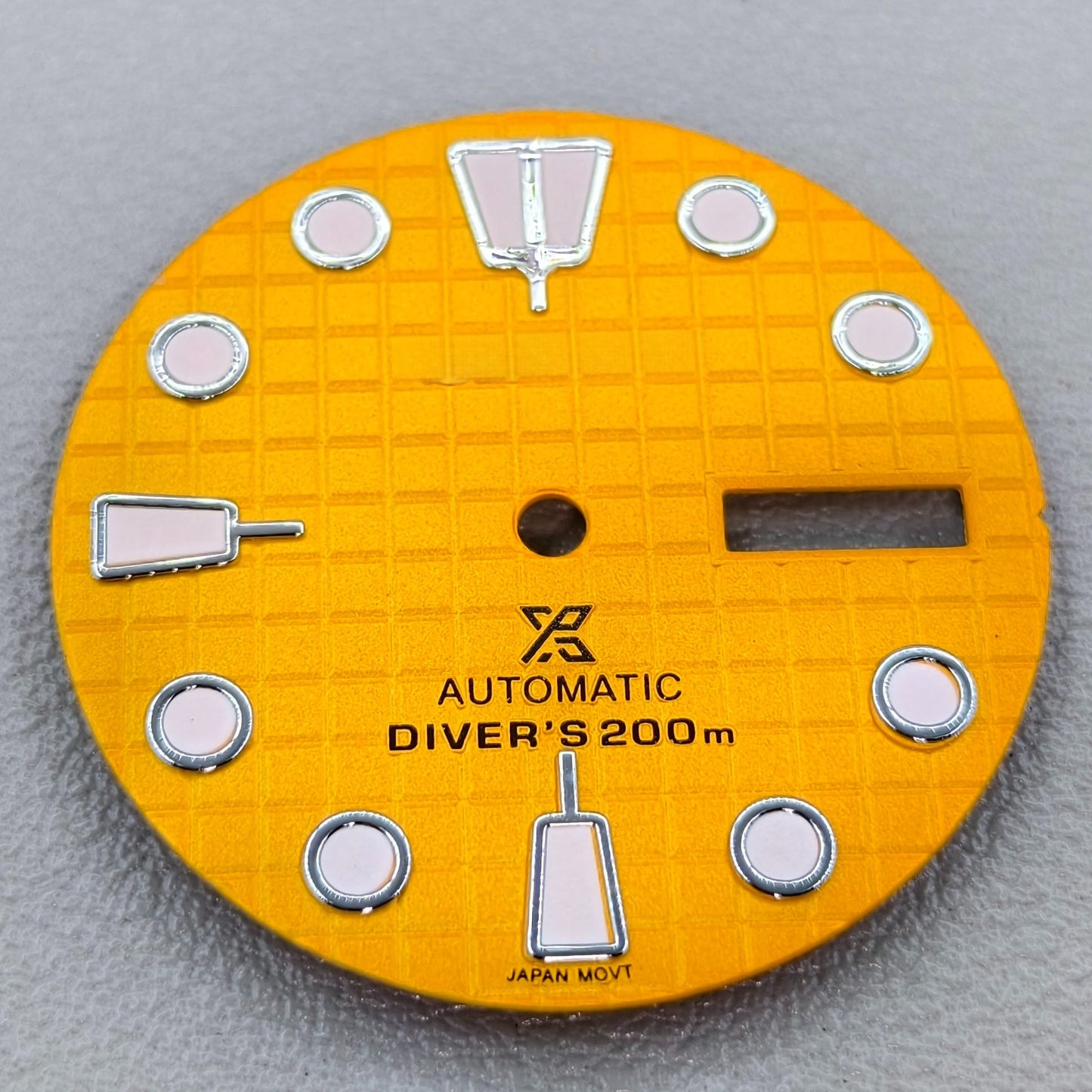 watch dial with S logo
