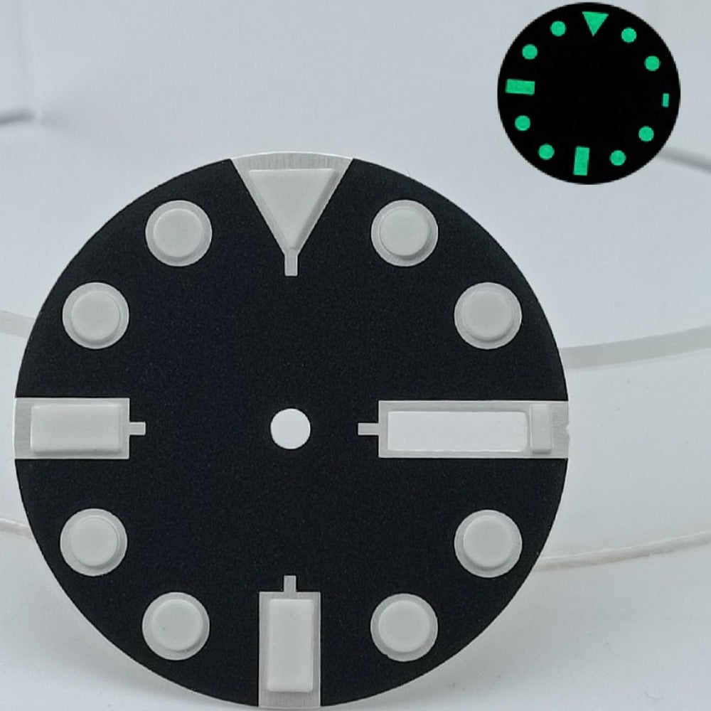 Black 28.5mm metal diving-style watch dial with green lume, compatible with NH36 movement, for precision timekeeping.