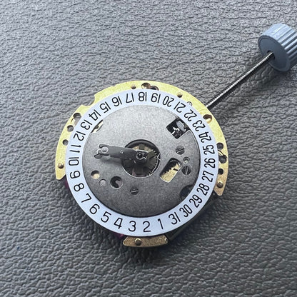 Swiss Ronda 775 quartz watch part with white date disk at 6 o'clock, ideal for precise repairs.