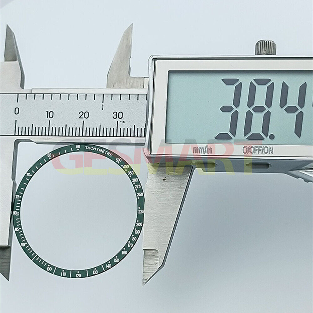 Omega Speedmaster 38.5mm green aluminum bezel with white font, durable alloy for watch accessory replacement.