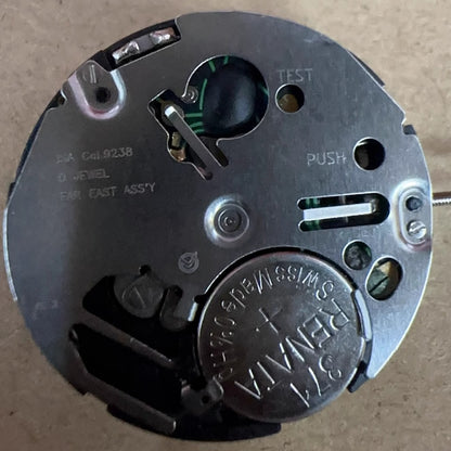 Swiss Made silver ISA 9238 watch movement with quartz 6-hand multifunction for precision timing.