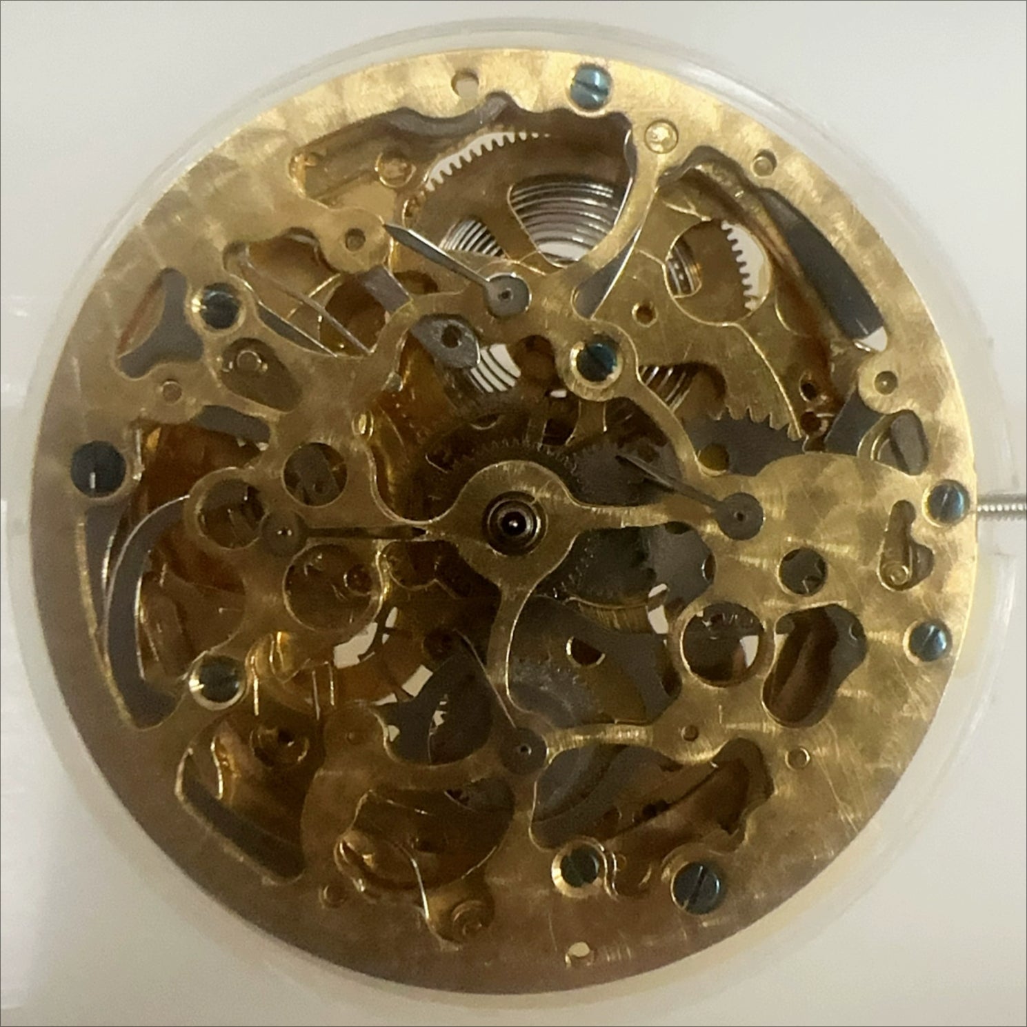 China Hangzhou 2189 automatic mechanical watch movement with 7 hands, hollow golden design for watch accessories.