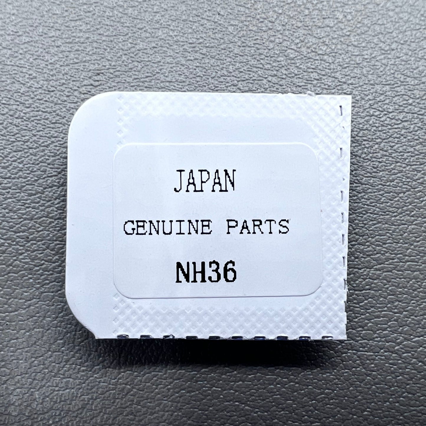 Barrel with complete mainspring for Seiko NH35 NH36 watch movement, durable replacement part.
