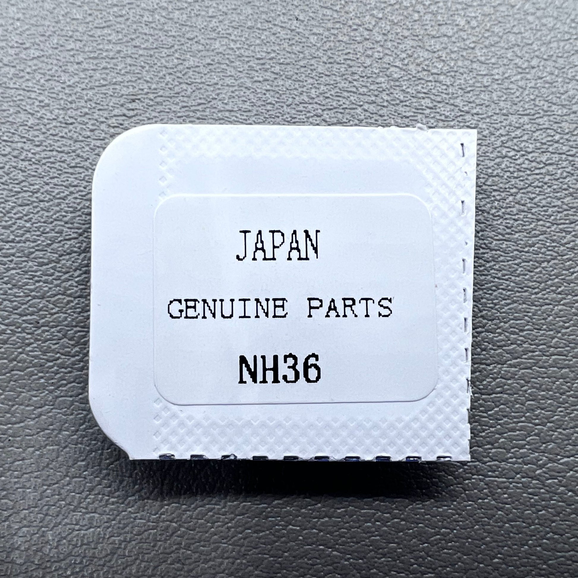 Barrel with complete mainspring for Seiko NH35 NH36 watch movement, durable replacement part.