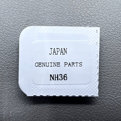Barrel with complete mainspring for Seiko NH35 NH36 watch movement, durable replacement part.