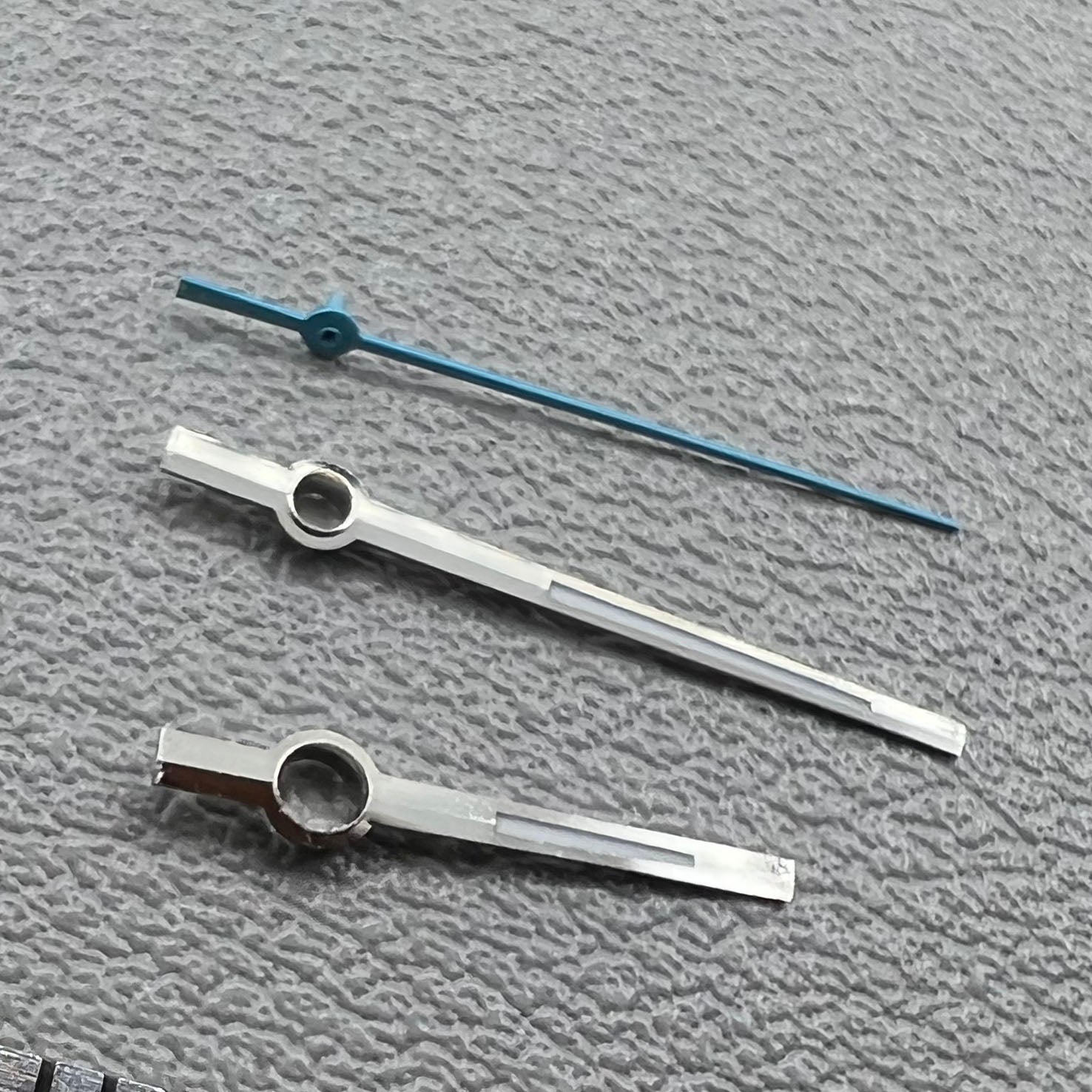 Blue second and silver-trimmed green lume hands set for Miyota 8285 movement.