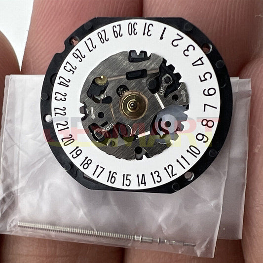Hattori Epson VX12E quartz watch movement with date display at 3 and 6 o'clock, Japan made.