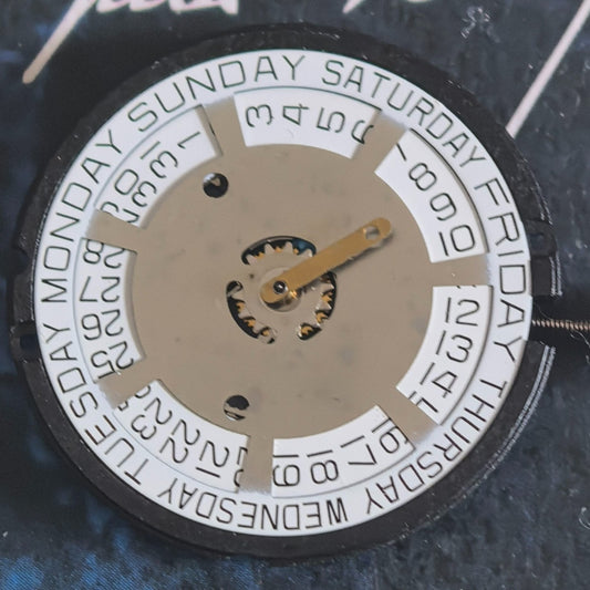 Swiss Made ETA805.144 quartz watch repair part with three white hands and disk for precise timekeeping.