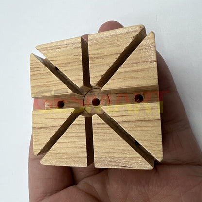 Wooden watch band holder for secure strap pin removal and repair tasks.