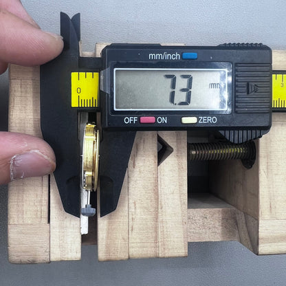 Golden plated Japan Miyota 8205 automatic mechanical watch movement, precision timekeeping component.