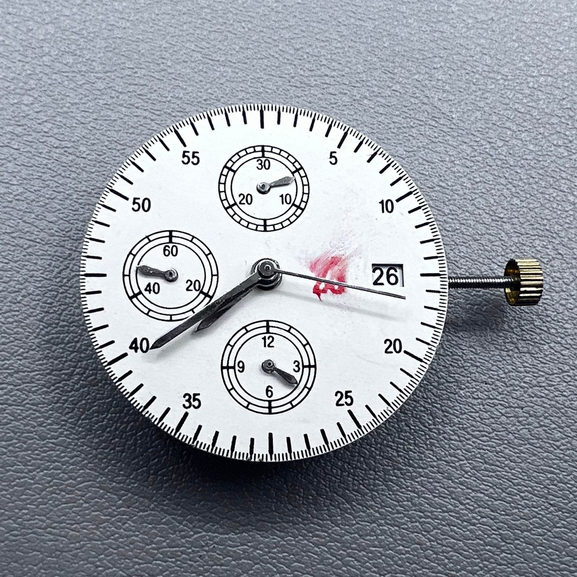 Shanghai 7750 mechanical watch movement with single calendar and small second at 9 o'clock, precision timekeeping.