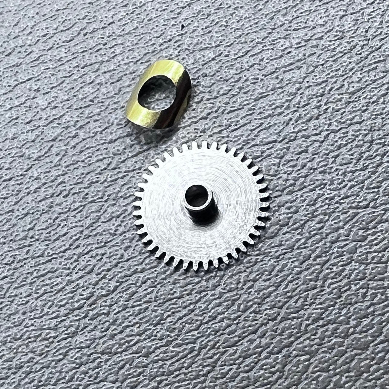 Set of 3 train bridge and hour wheel components for Seagull ST3600 and ETA6497 watch movements.