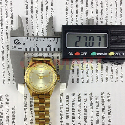 TAISHAN 27mm manual mechanical lady watch with imitation diamond markers, elegant design for stylish wear.