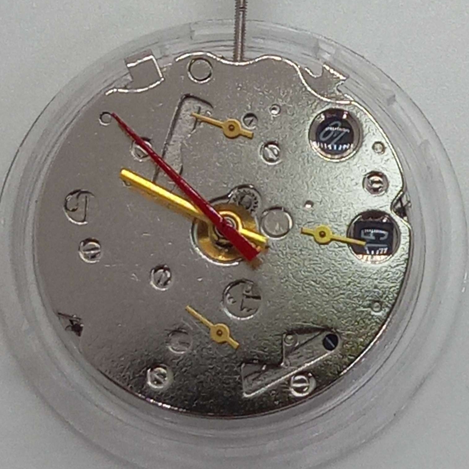 ST16 mechanical watch part with black calendar and 7 hands, date at 6, precision China-made component.