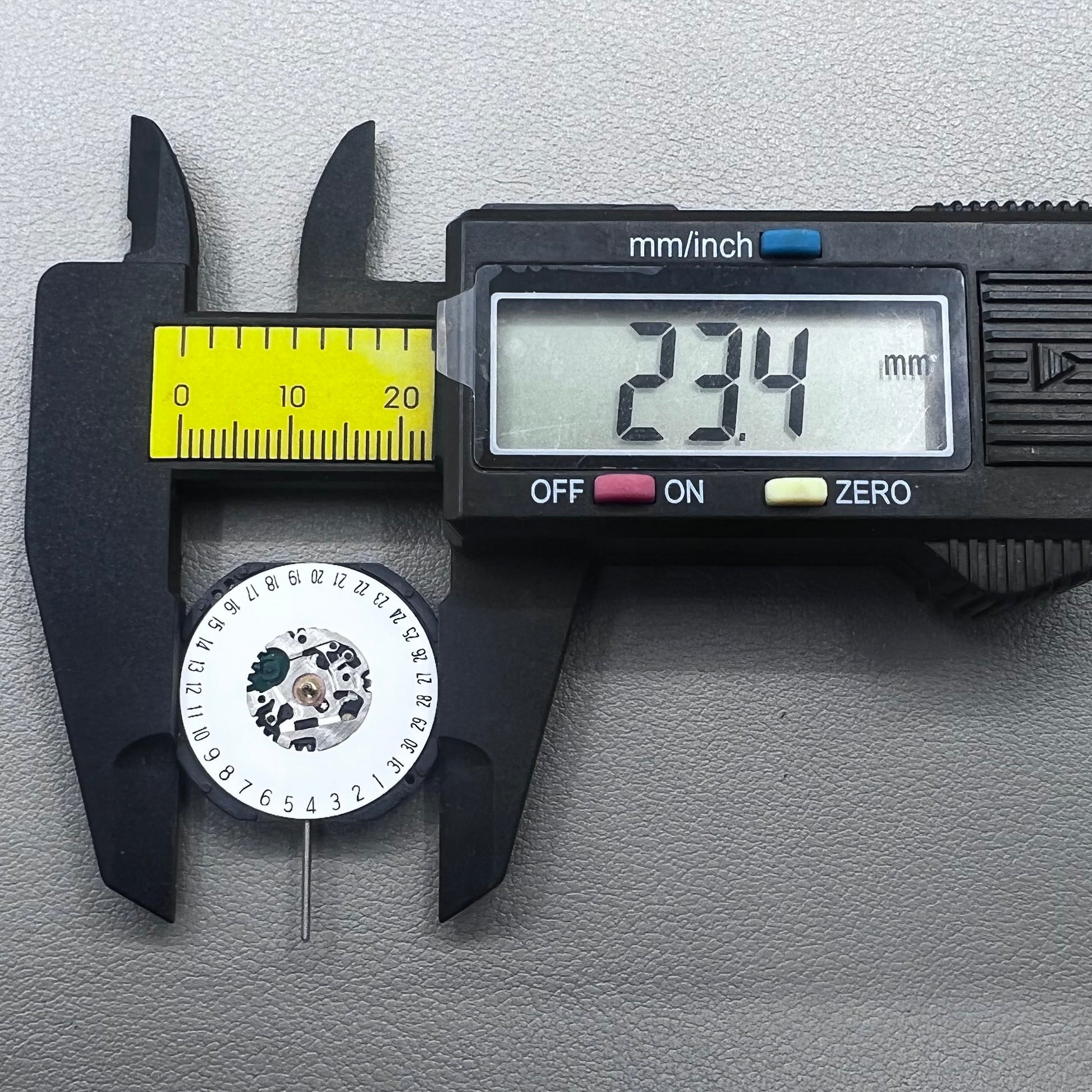Japan Hattori Epson VX42E quartz watch movement with date display at 6 o'clock, precision timing.