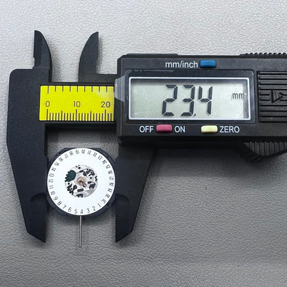 Japan Hattori Epson VX42E quartz watch movement with date display at 6 o'clock, precision timing.