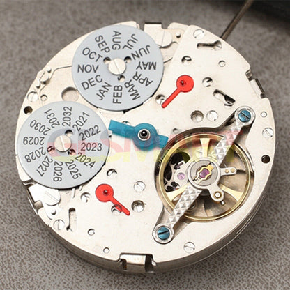 Asian Dandong silver hollow balance wheel automatic watch movement displaying precise mechanical engineering.