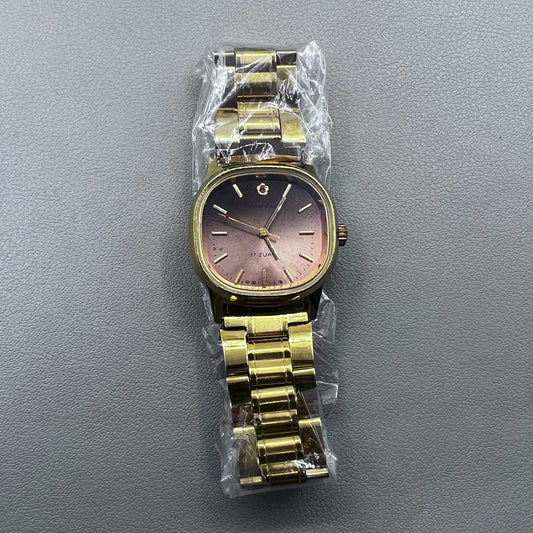 33mm Shanghai Golden Nail watch with manual mechanical movement and square gold case, 17 jewels detail.