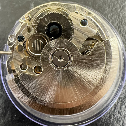 China Made 2240 automatic mechanical watch part with single calendar and 2 hands, precision movement component.