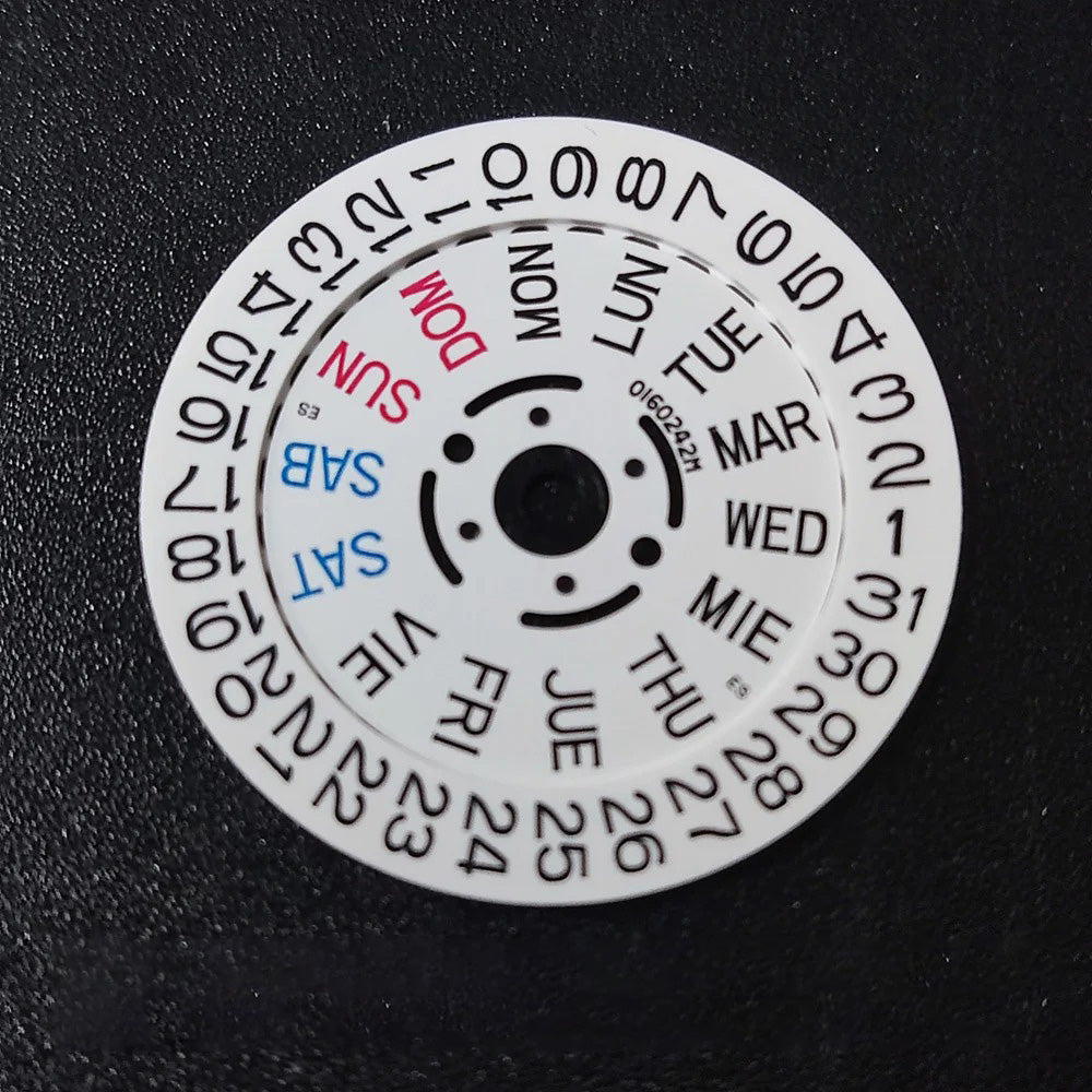 NH36 watch movement with hand-held calendar date disc wheel and day match features.