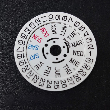 NH36 watch movement with hand-held calendar date disc wheel and day match features.